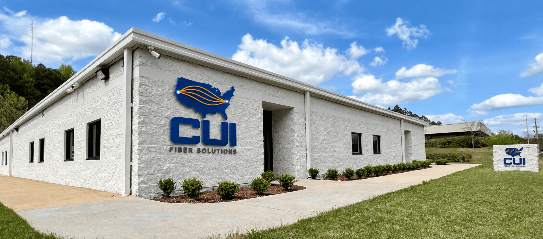 CUI office building shown with updated CUI Fiber Solutions signage